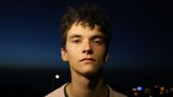 Fionn Whitehead proves size doesn't matter in the race for the red and blue suit (Image via Missing Link Films)
